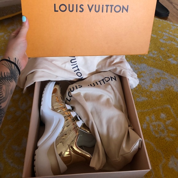 Metallic Gold Louis Vuitton arch light sneakers. - Picture 2 of 7
